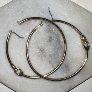 Coach hoop earrings with interlocking C’s